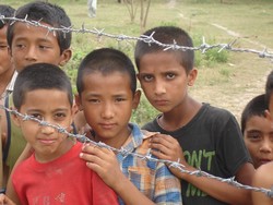 Young Bhutanese boys outside Nepal’s Khundunabari refugee camp in southeastern Jhapa District. There are close to 95,000 Bhutanese refugees in the Himalayan nation.(Photo: David Swanson/IRIN)